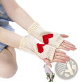Cream-colored knitted fingerless gloves with red heart embroidery featured in heart fingerless knit arm warmers