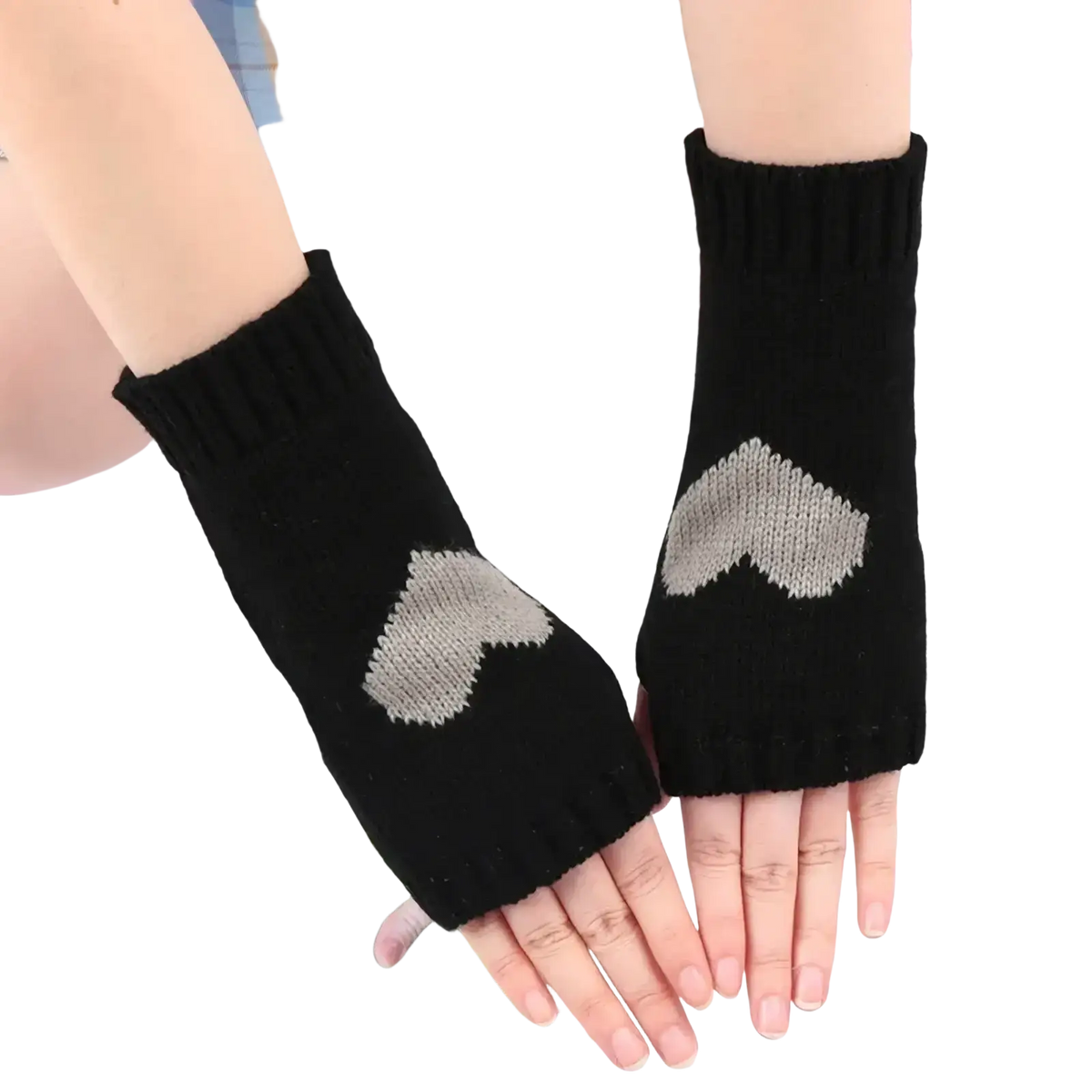 Black knitted heart fingerless arm warmers showing the back side with a light gray heart design on each hand