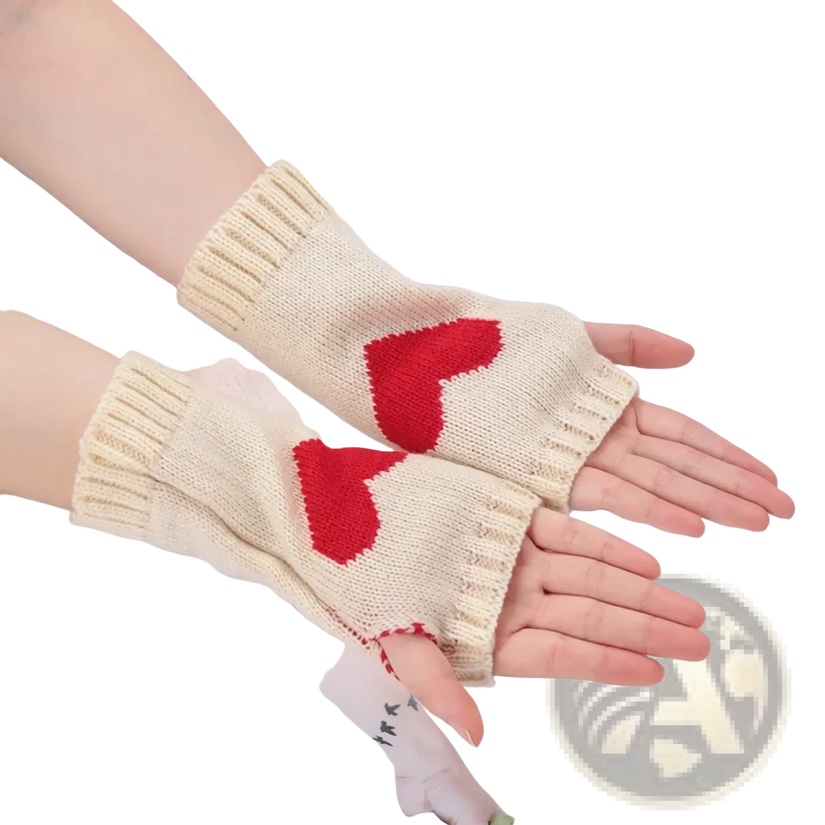 Cream-colored knitted fingerless gloves with red heart designs featuring a cozy arm warmer style