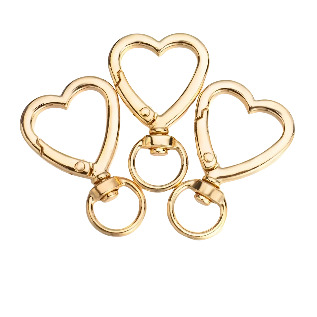 Gold heart-shaped keychain clips with polished metallic finish and swivel rings in a heart keychain 3pack enamel gold heart clasp ring