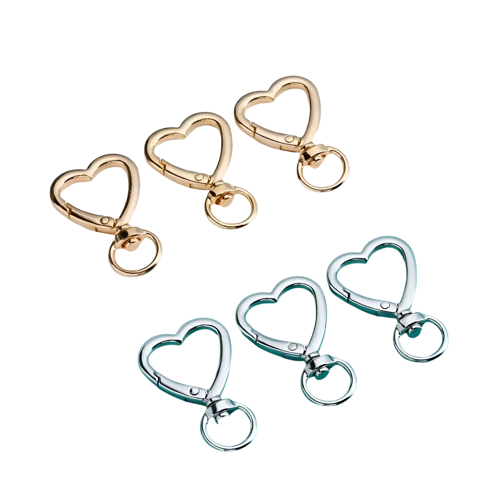 Heart keychain 3pack featuring gold and silver heart-shaped snap hooks with polished metallic finish and enamel accents