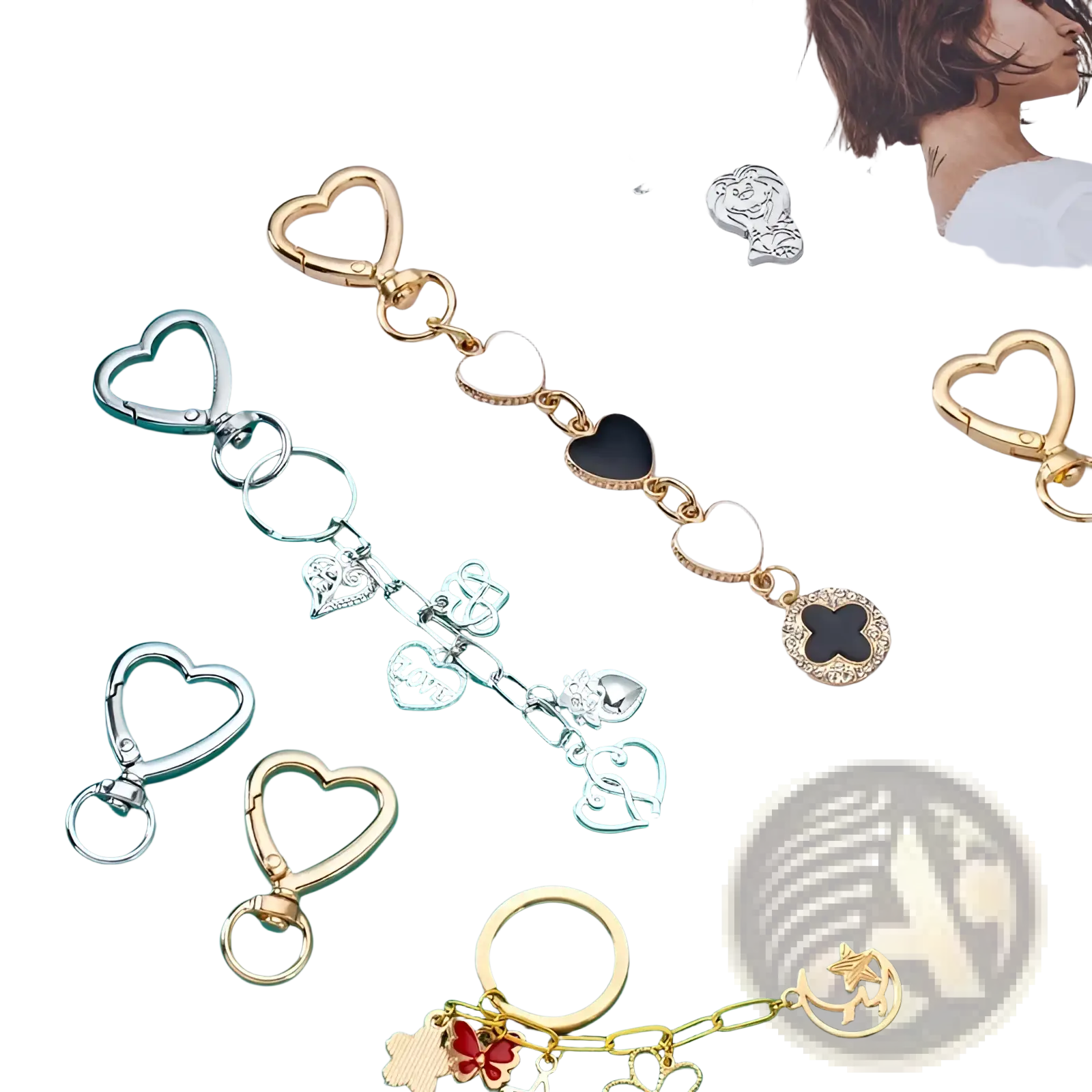 A gold-toned heart keychain with white and black enamel hearts and intricate metal charms clasp ring design