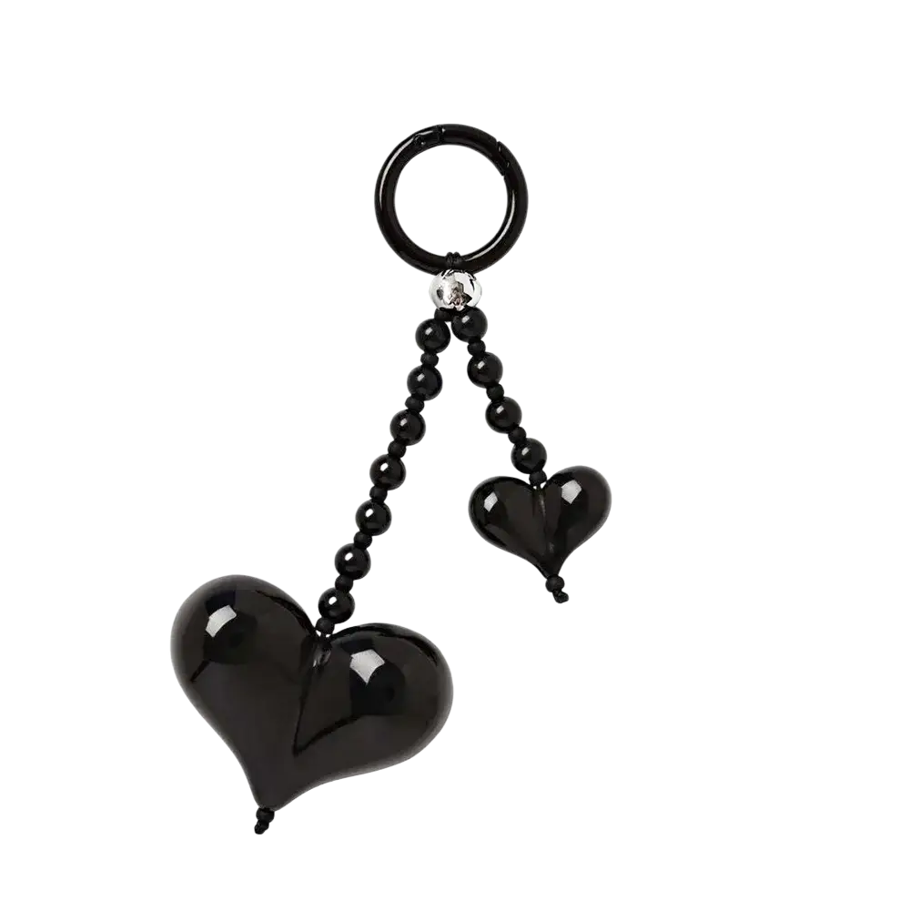 Black glossy heart keychain with silver clasp and black beaded chains as a bag charm accessory
