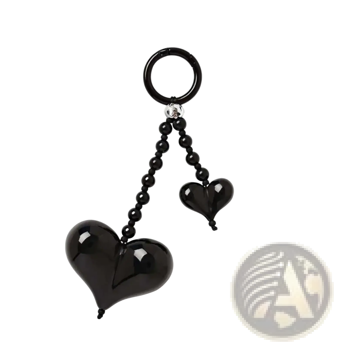 Black glossy heart keychain with silver clasp and black beaded chains as a bag charm accessory