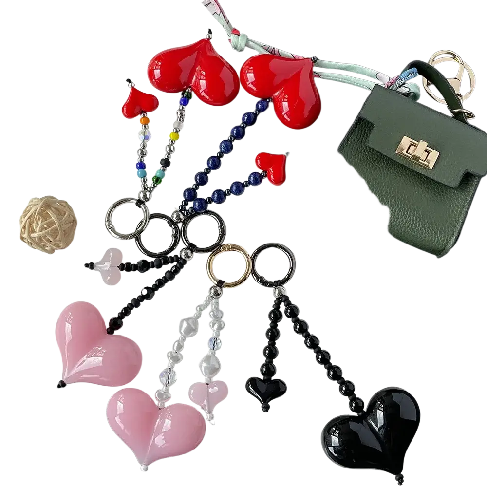 Heart keychain beaded bag charm featuring glossy red pink and black heart shapes with multicolored beaded chains