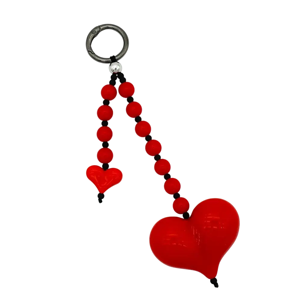 Red heart keychain beaded bag charm with glossy finish and red black bead chain featuring two dangling hearts