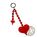 Red heart keychain beaded bag charm with glossy finish and red black bead chain featuring two dangling hearts