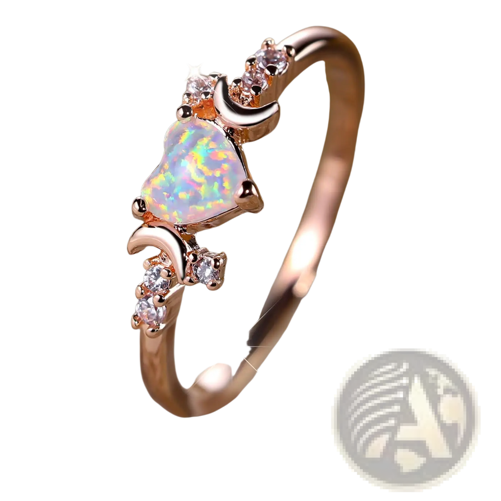 A rose gold heart opal crescent moon ring with diamonds featuring a central heart-shaped opal and clear gemstones