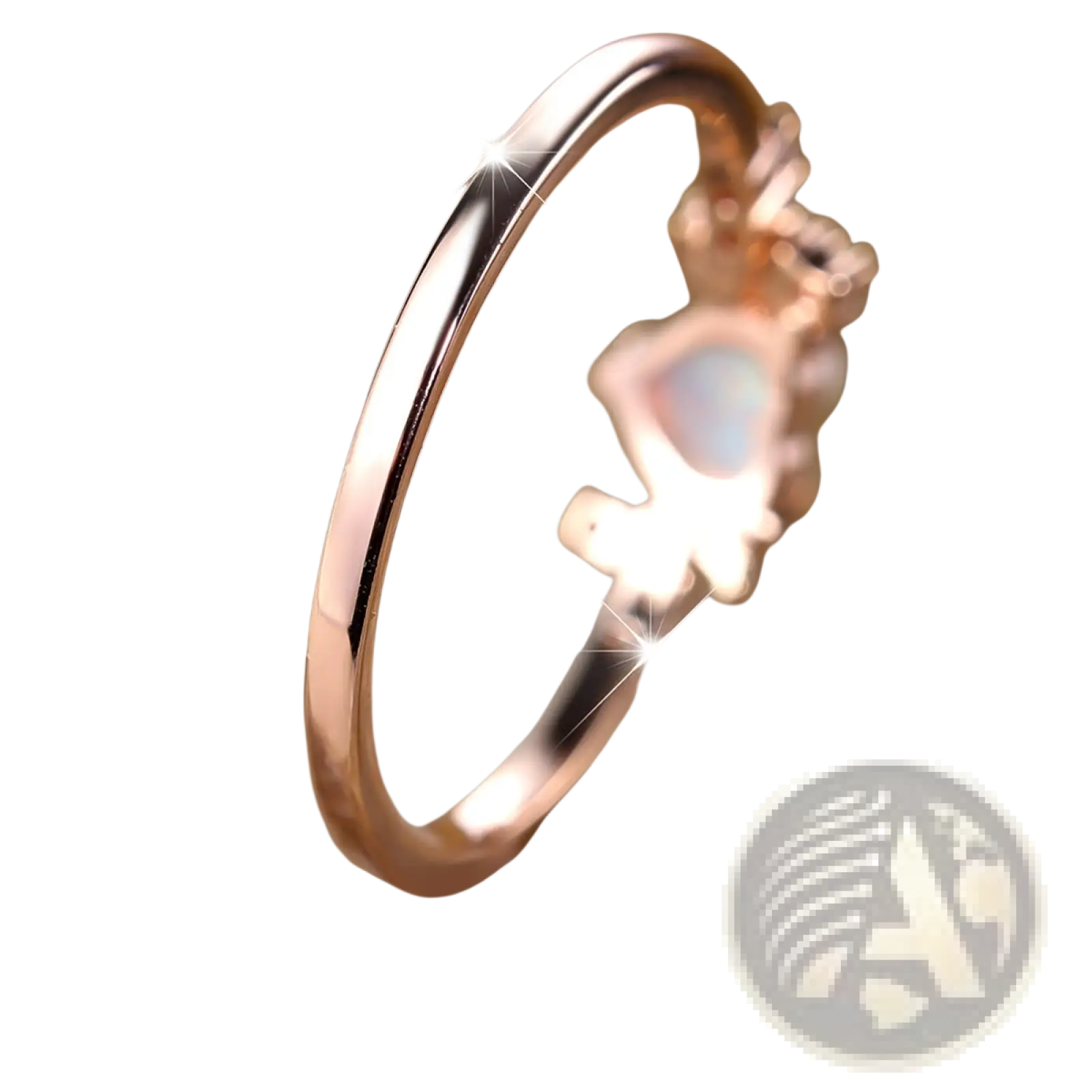 Heart opal crescent moon ring in rose gold featuring a central opal stone with an ornate crown-like design