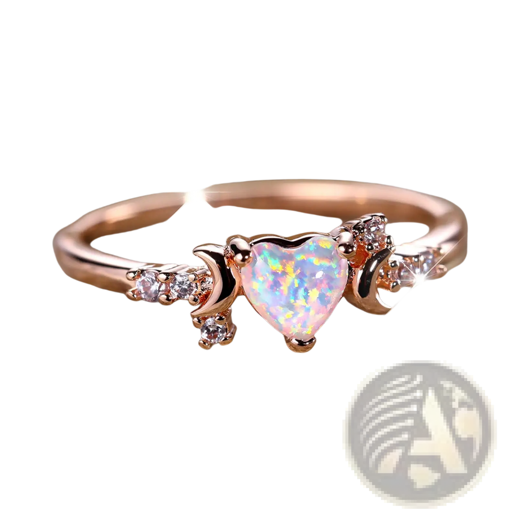Rose gold heart opal crescent moon ring with diamonds featuring a central heart-shaped opal and clear gemstones