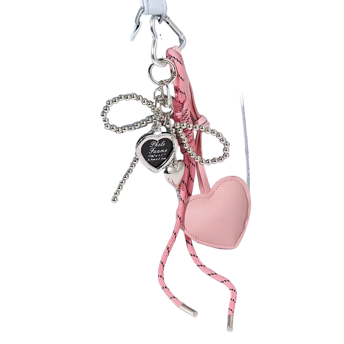 Pink heart pendant bowknot leather bag keychain with silver frame and beaded chain on light blue handbag