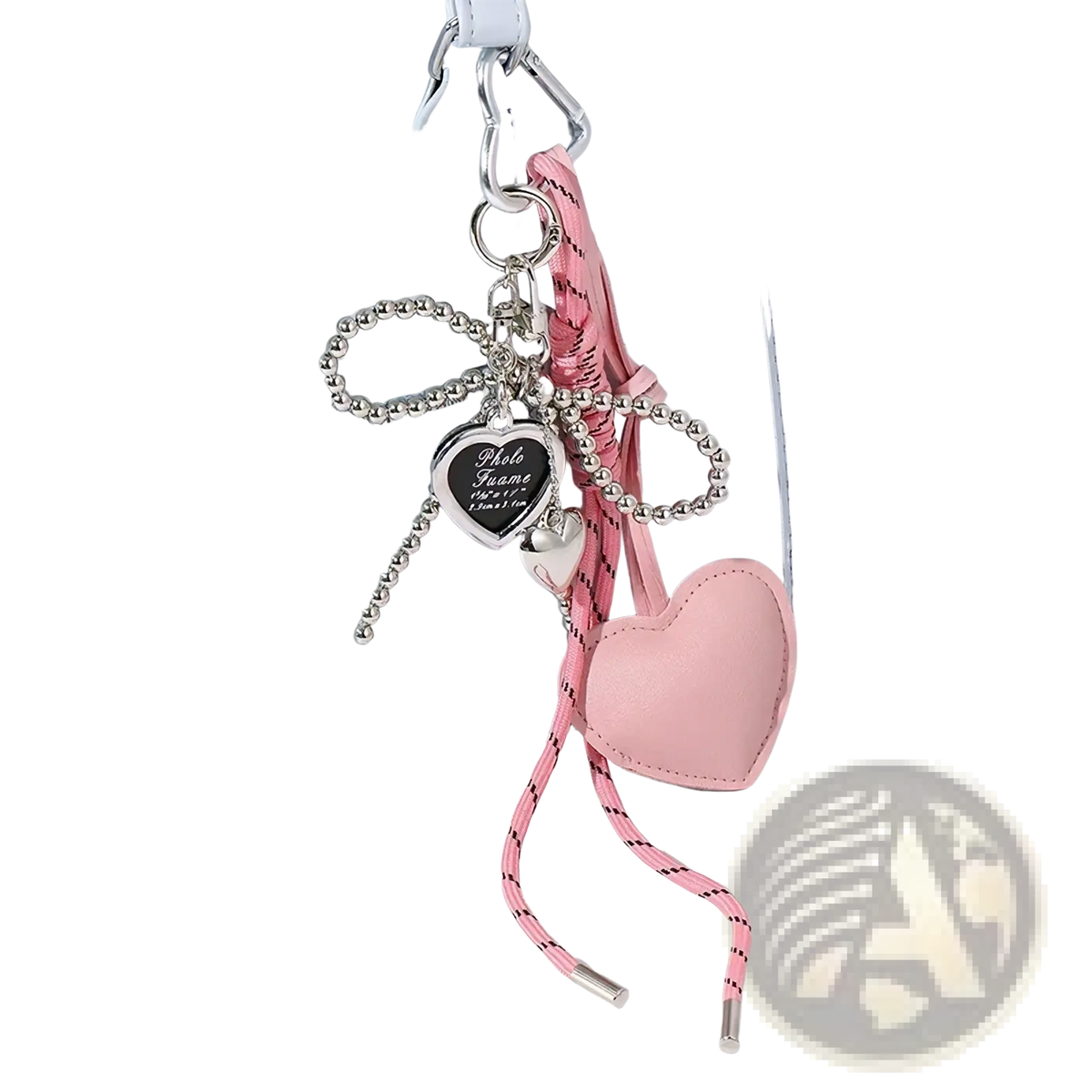 Pink heart pendant bowknot leather bag keychain with silver frame and beaded chain on light blue handbag