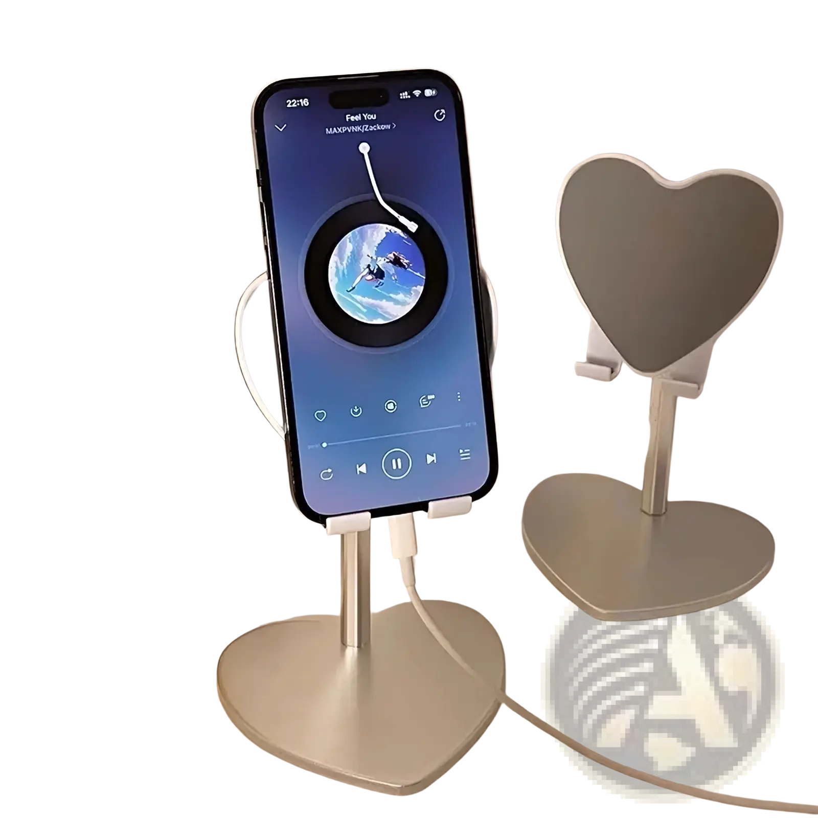 Silver heart-shaped adjustable desktop phone stand with sleek minimalist design holding an iPhone
