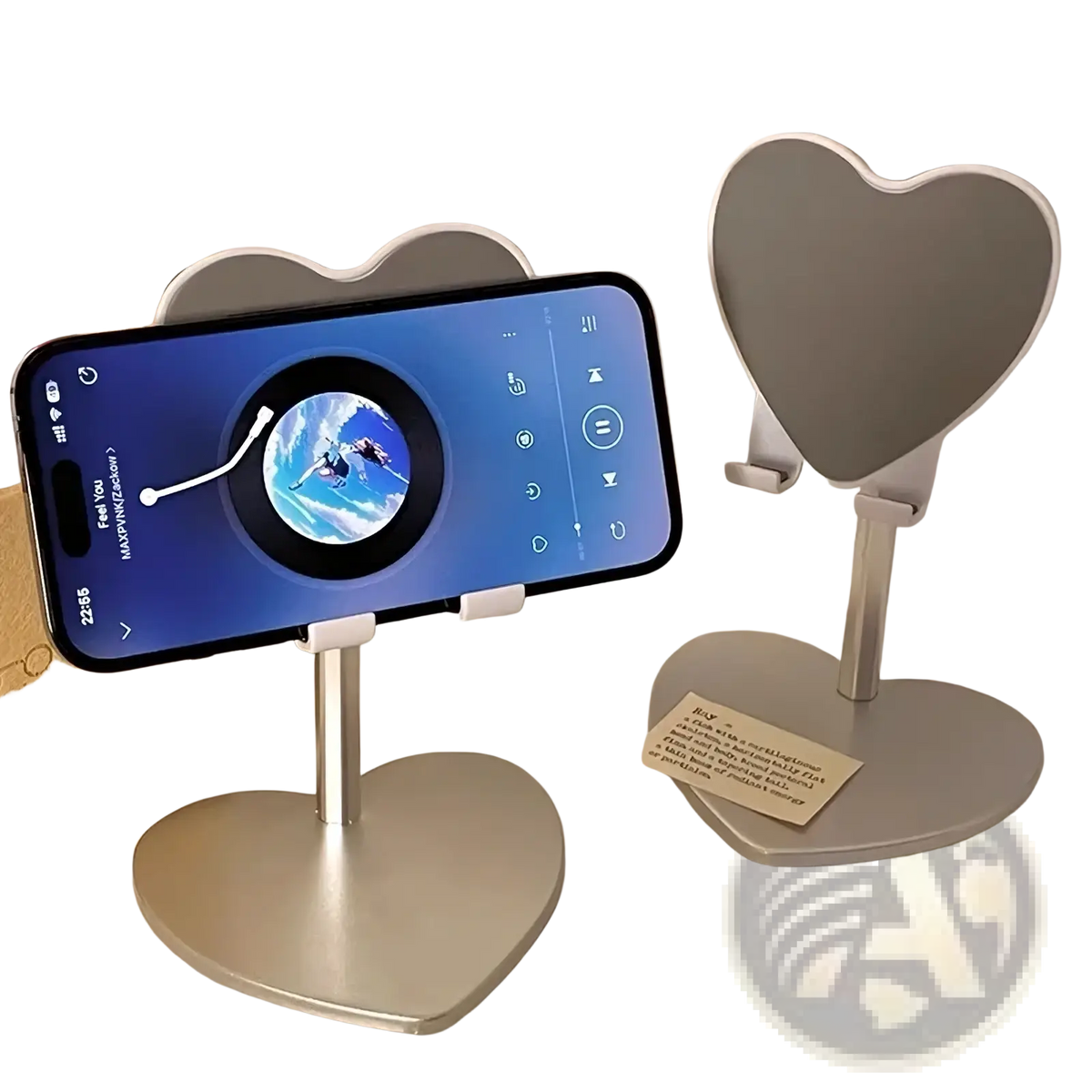 Silver heart-shaped adjustable desktop phone stand holding a smartphone for convenient hands-free use