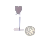 A sleek heart-shaped phone stand with adjustable height and metallic silver finish for desktop use