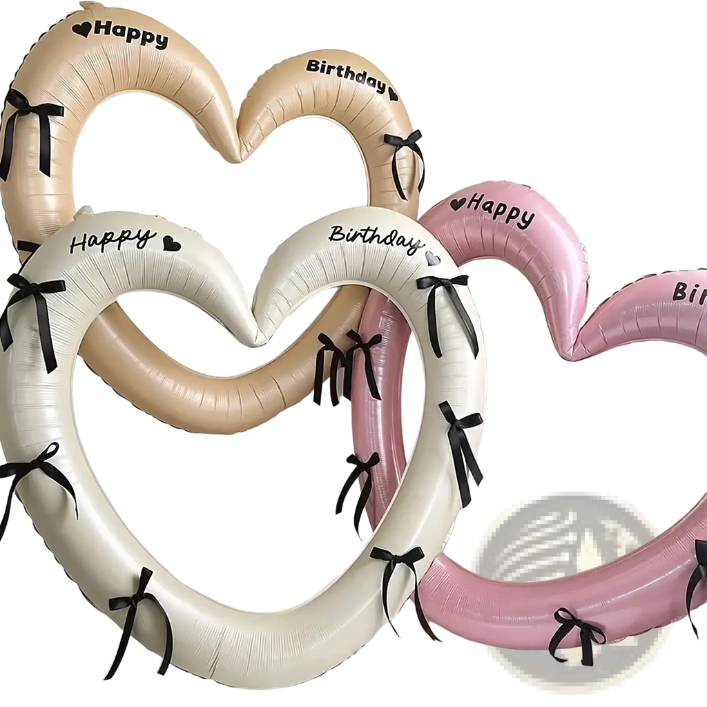 Heart photo frame balloon party decoration featuring beige and pink heart-shaped arches with black ribbon accents