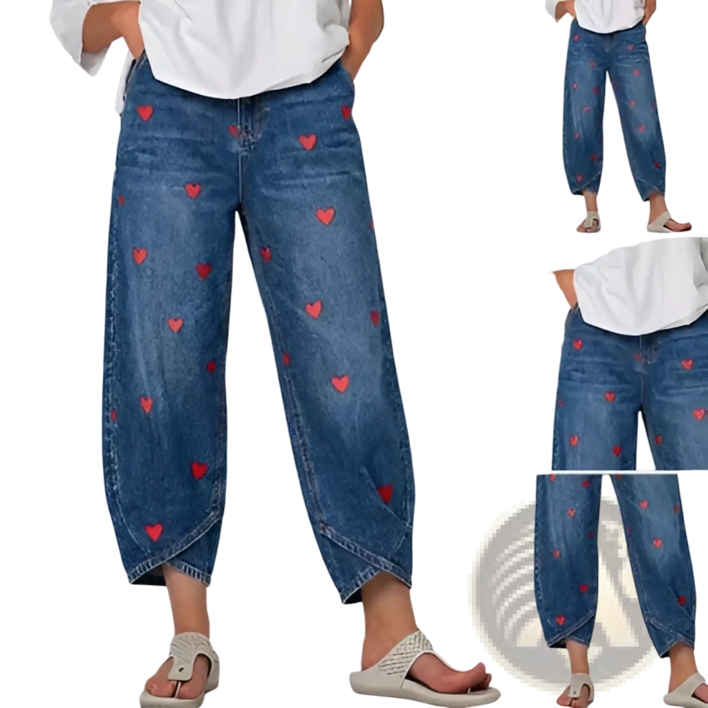 Blue denim jeans for women featuring red heart embroidery on durable cotton fabric