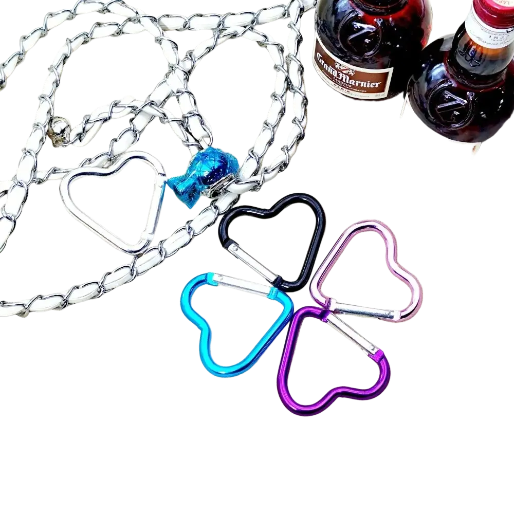 Set of four heart shaped carabiner keychains in black blue pink and purple metallic finishes for versatile use