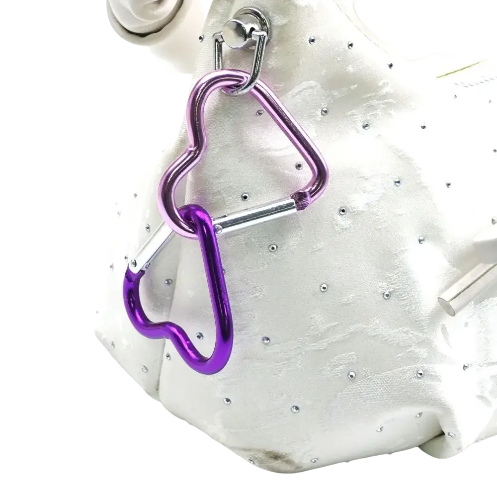 Heart shaped carabiner keychain set featuring linked purple and silver metal heart shaped carabiners