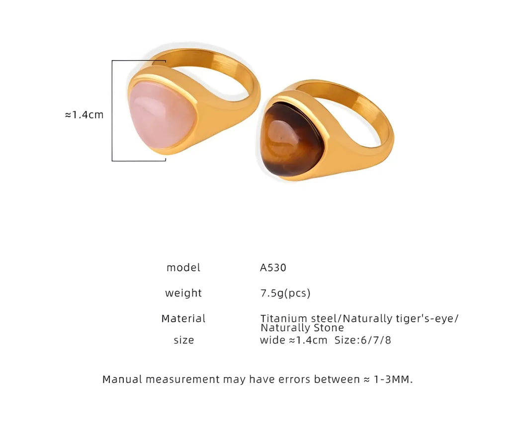 Heart shaped natural stone titanium steel signet ring with gold-toned oval stone set in a sleek titanium band