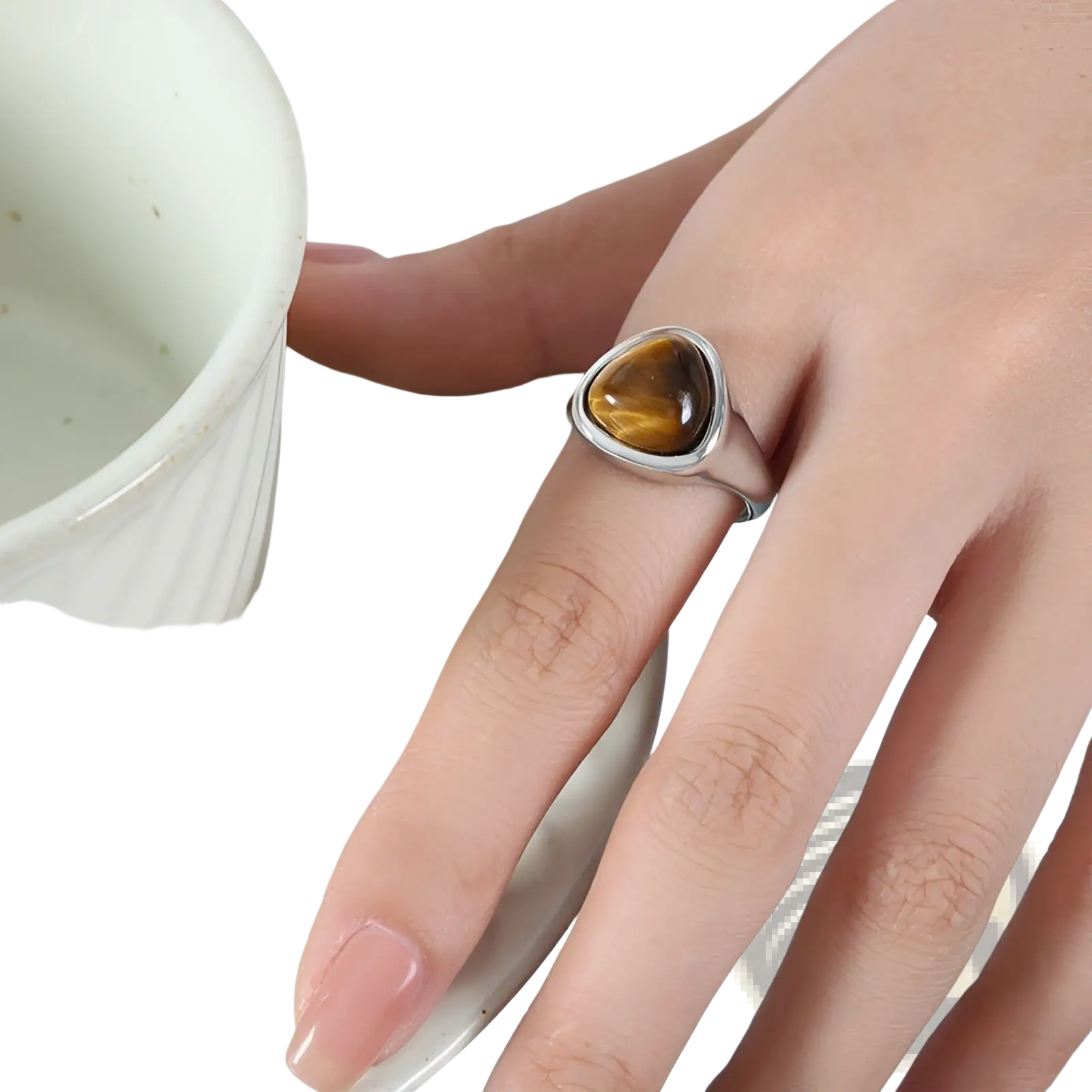 A sleek silver heart shaped tiger’s eye stone titanium steel signet ring with warm golden brown and black banding