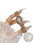 A gold-toned heart shaped women designer watch with rhinestones roman numerals and stainless steel linked bracelet strap