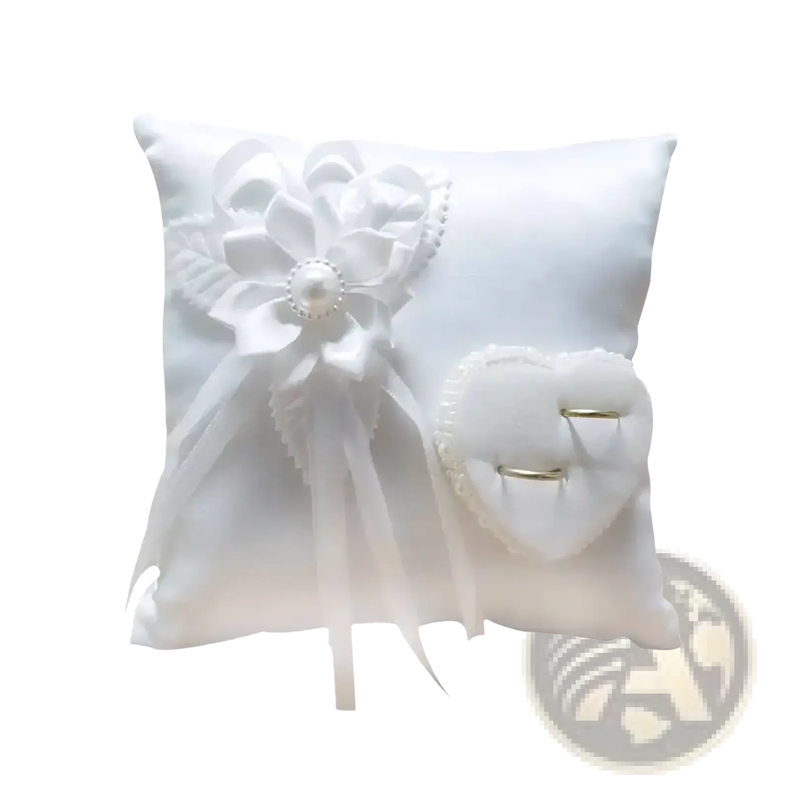 White satin heart wedding ring pillow with delicate floral bow and heart-shaped ring holder for bridal ceremony