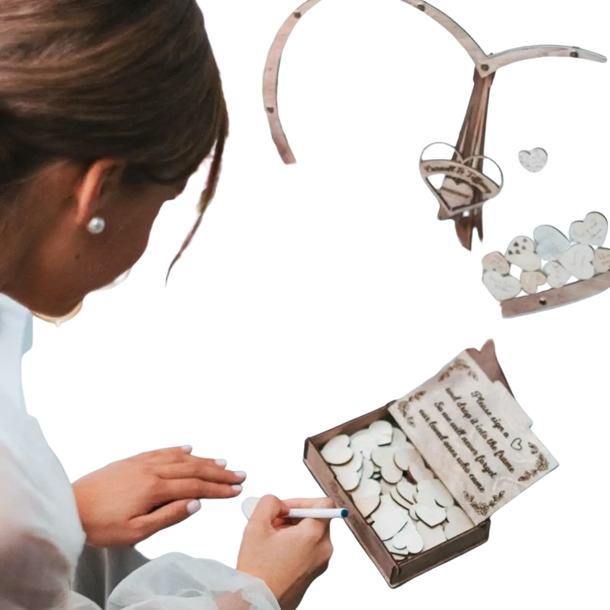 Wooden heart shaped wedding guest book drop box with engraved initials and white wooden hearts inside