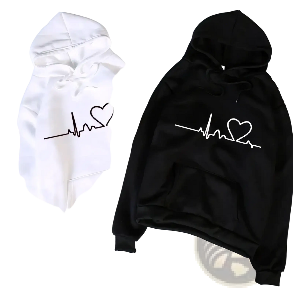 A pair of black and white heartbeat couple hoodies with minimalist heart-shaped electrocardiogram line designs