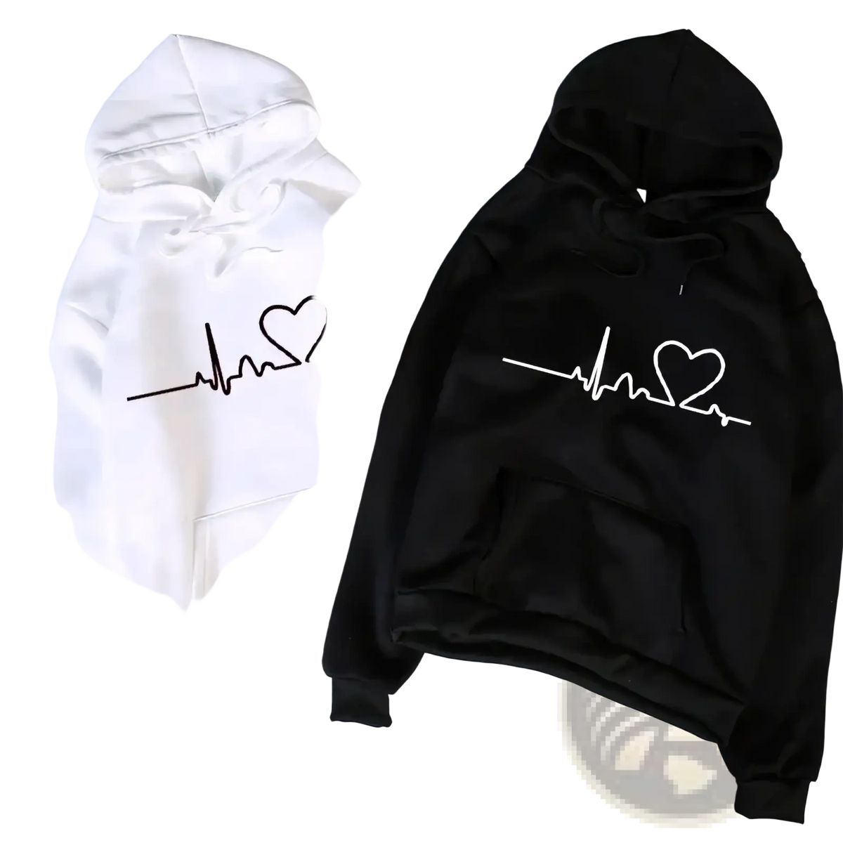 A pair of black and white heartbeat couple hoodies with minimalist heart-shaped electrocardiogram line designs