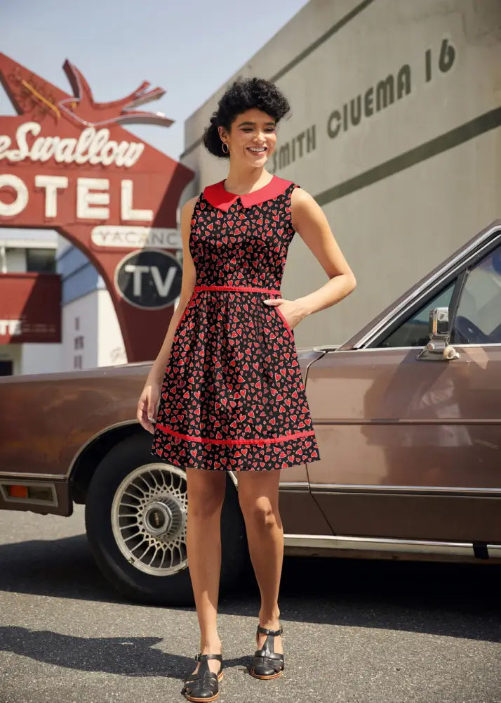 Retro Hearts sleeveless cotton dress in black with red polka dots and red peter pan collar and hem trim