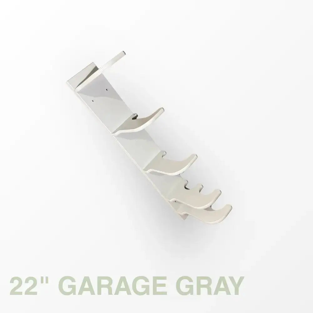 Silver metallic wall-mounted shoe rack with four angled slots made of birch plywood for heavy duty garage storage