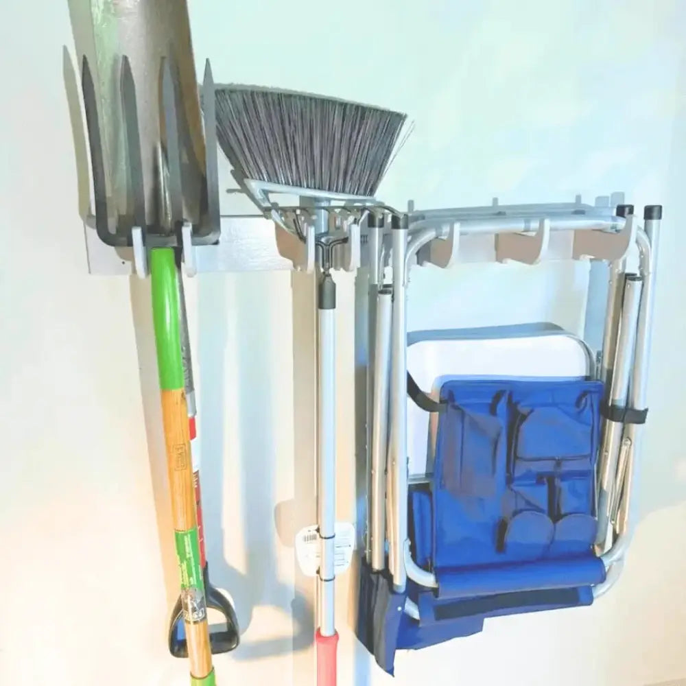 Birch plywood heavy duty silver metal wall-mounted garage tool rack holding shovel broom and folding chair