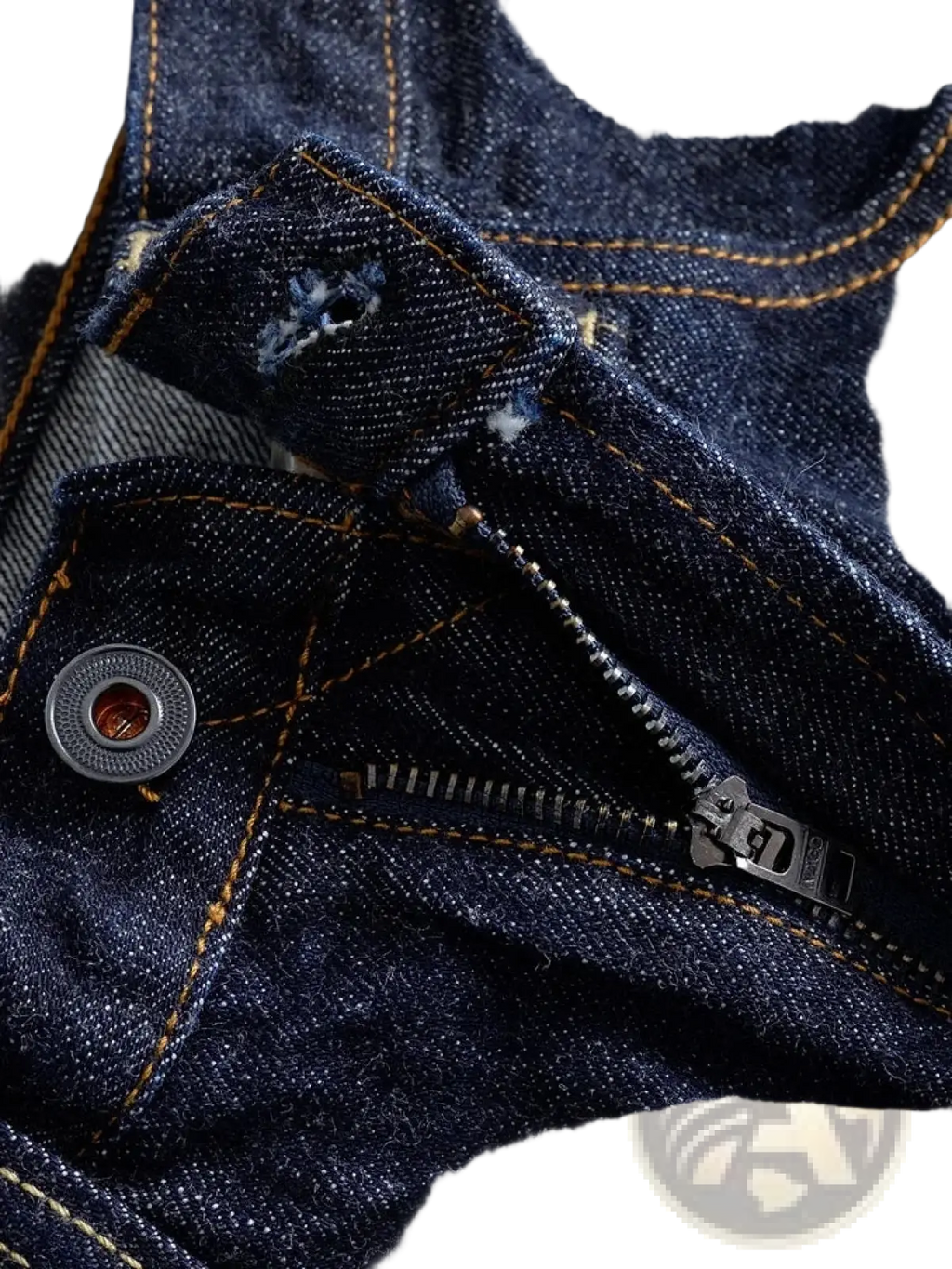 Heavyweight red selvedge denim jeans in dark blue with contrasting yellow stitching and a silver-toned button