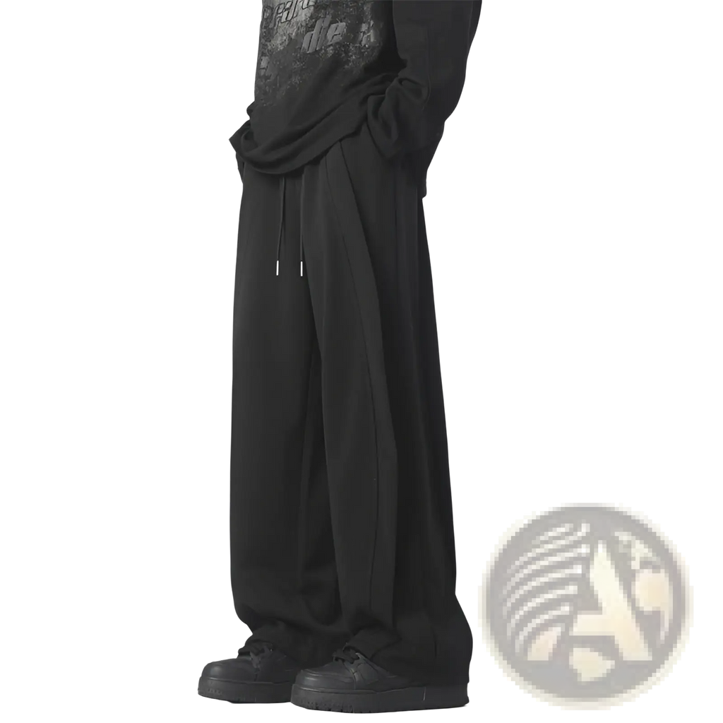 Black heavyweight straight leg sweatpants with a relaxed flowing silhouette and drawstring waist detail