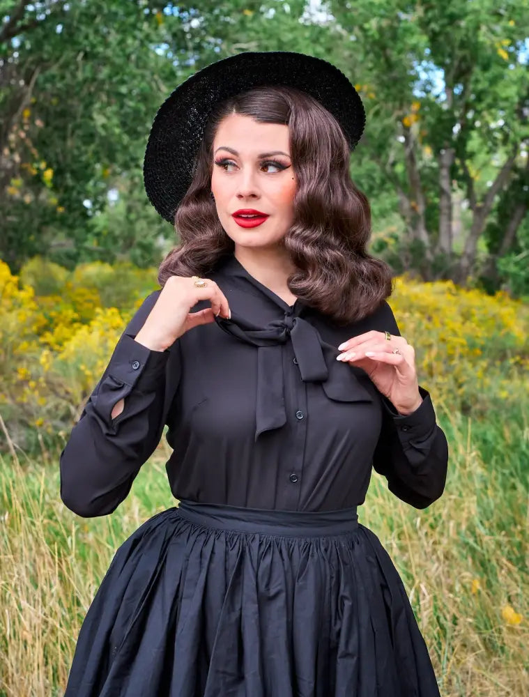 Helen retro black bow tie long sleeve blouse in vintage style paired with a matching black hat