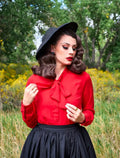 A vibrant red long-sleeved plus size blouse with a prominent bow tie neckline for retro style looks