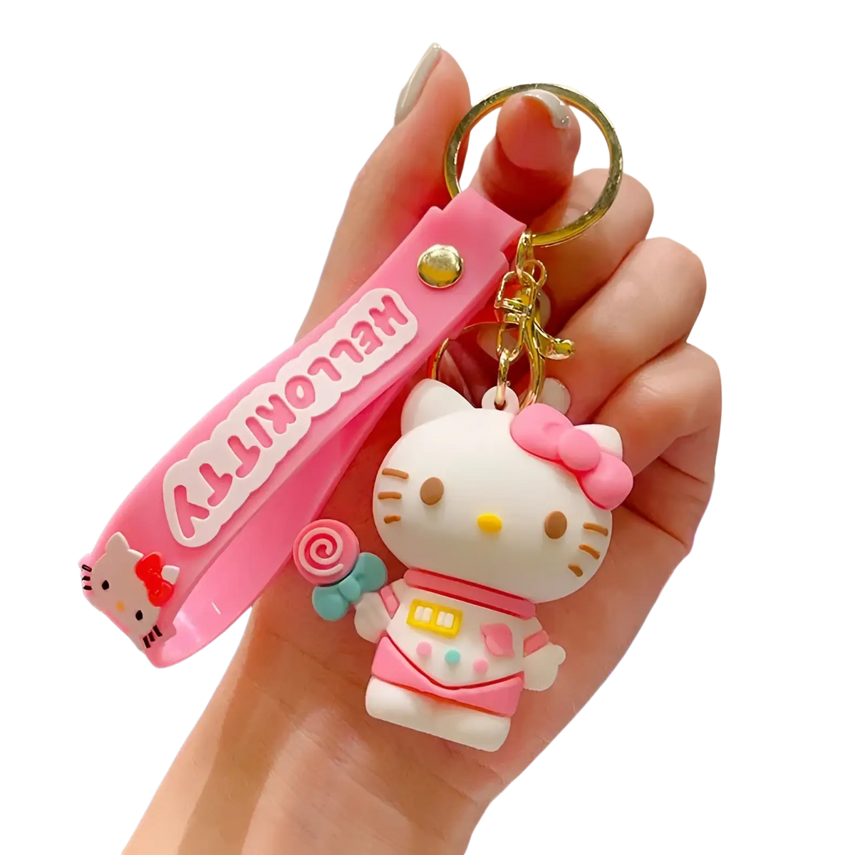 Pink silicone hello kitty cartoon keychain with white character wearing pink accessories holding a lollipop bag charm