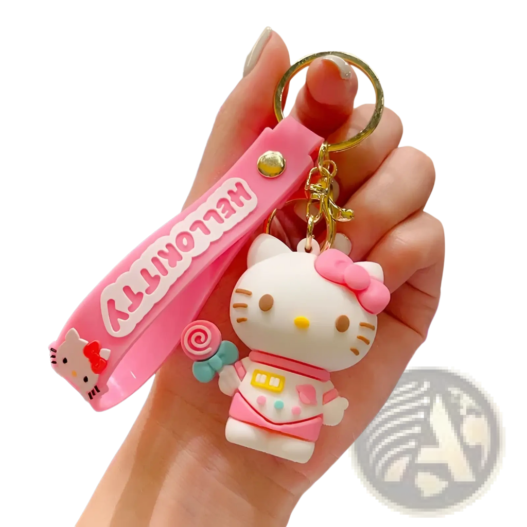 Pink silicone hello kitty cartoon keychain with white character wearing pink accessories holding a lollipop bag charm