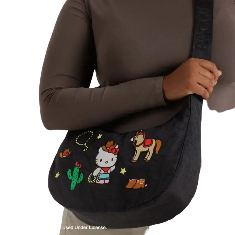 Black hello kitty dumpling crossbody bag with embroidered western cactus horse and cowboy boots design