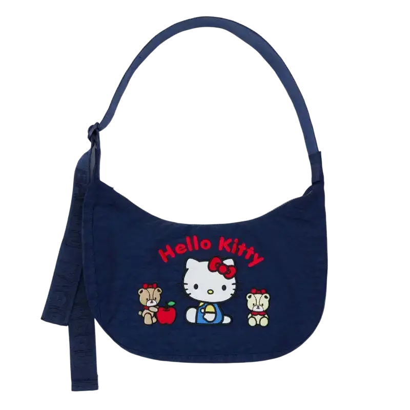 Navy blue Hello Kitty dumpling crossbody bag with embroidered characters and red lettering for shoulder use