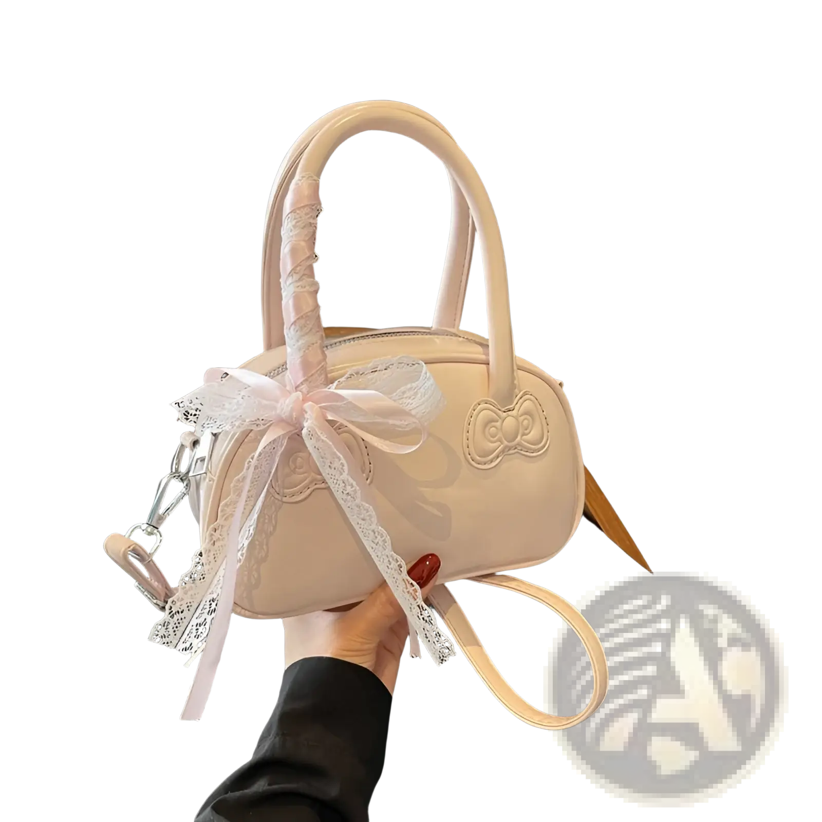 A blush pink glossy Hello Kitty crossbody bag with bow detail lace trim handles and a matching satin ribbon bow