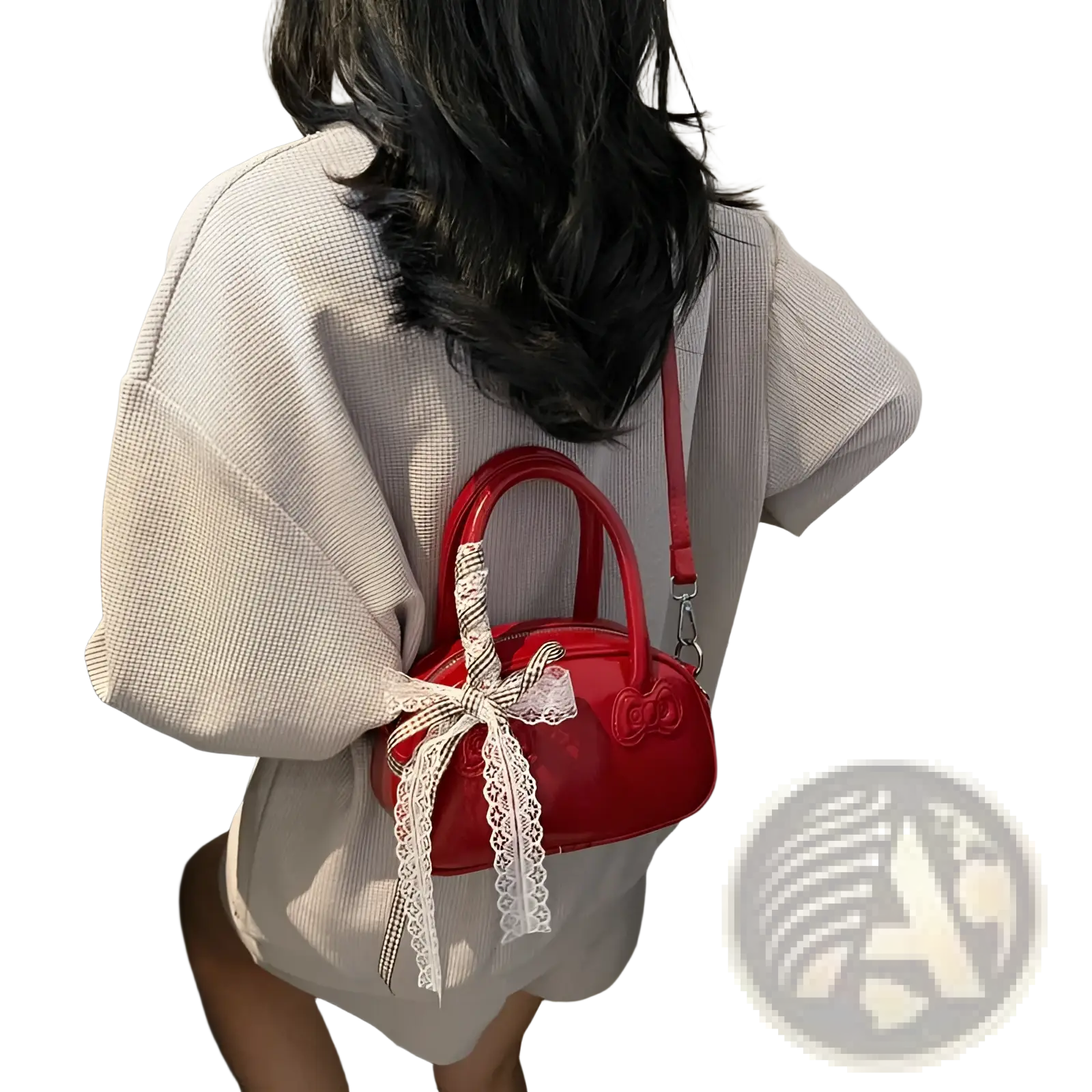 A glossy red hello kitty crossbody bag with a white lace bow and matching strap made of patent material