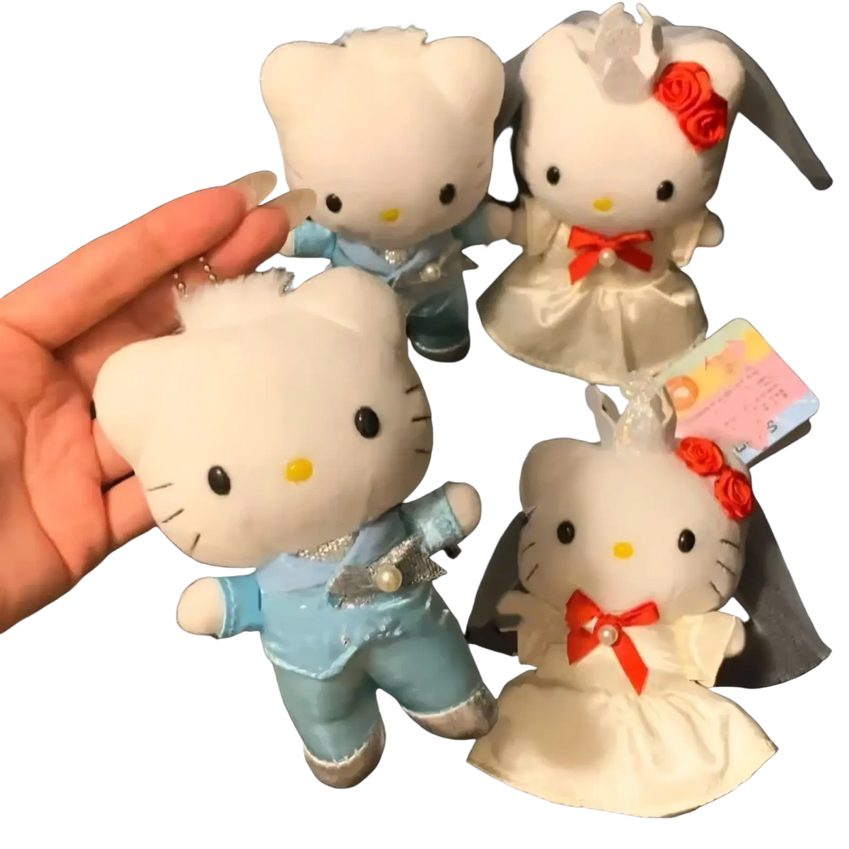 White hello kitty wedding couple plush keychain in blue and white attire with red bows and veils