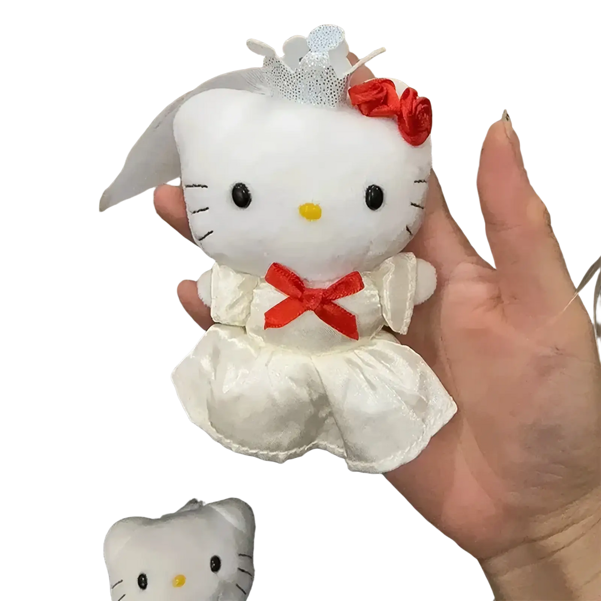Hello kitty wedding couple plush keychain featuring a white satin doll in a wedding gown with red ribbons and lace veil