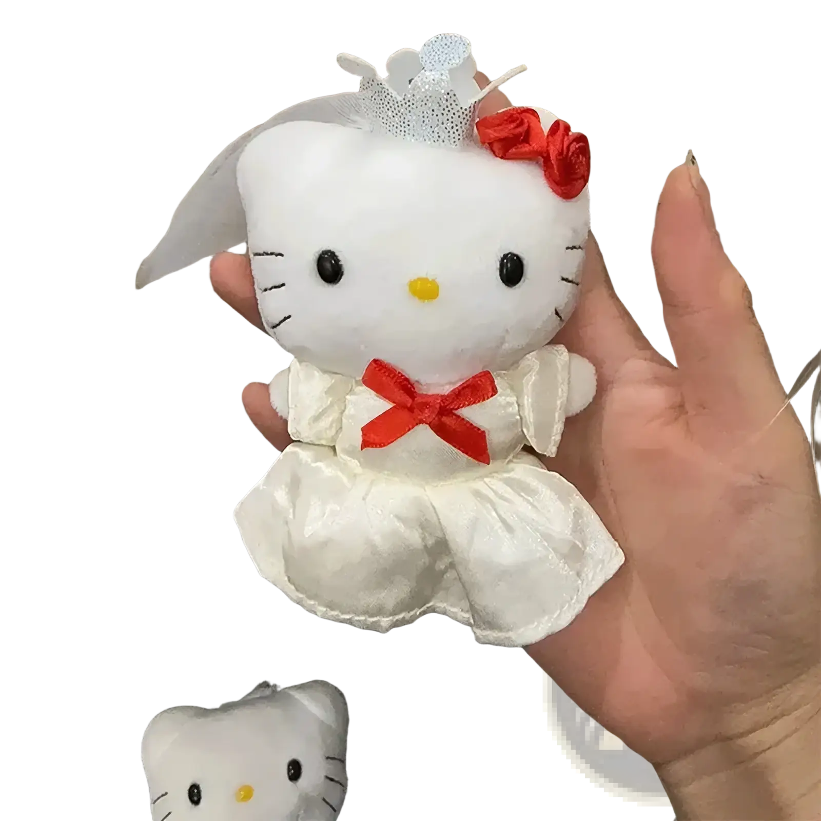 Hello kitty wedding couple plush keychain featuring a white satin doll in a wedding gown with red ribbons and lace veil