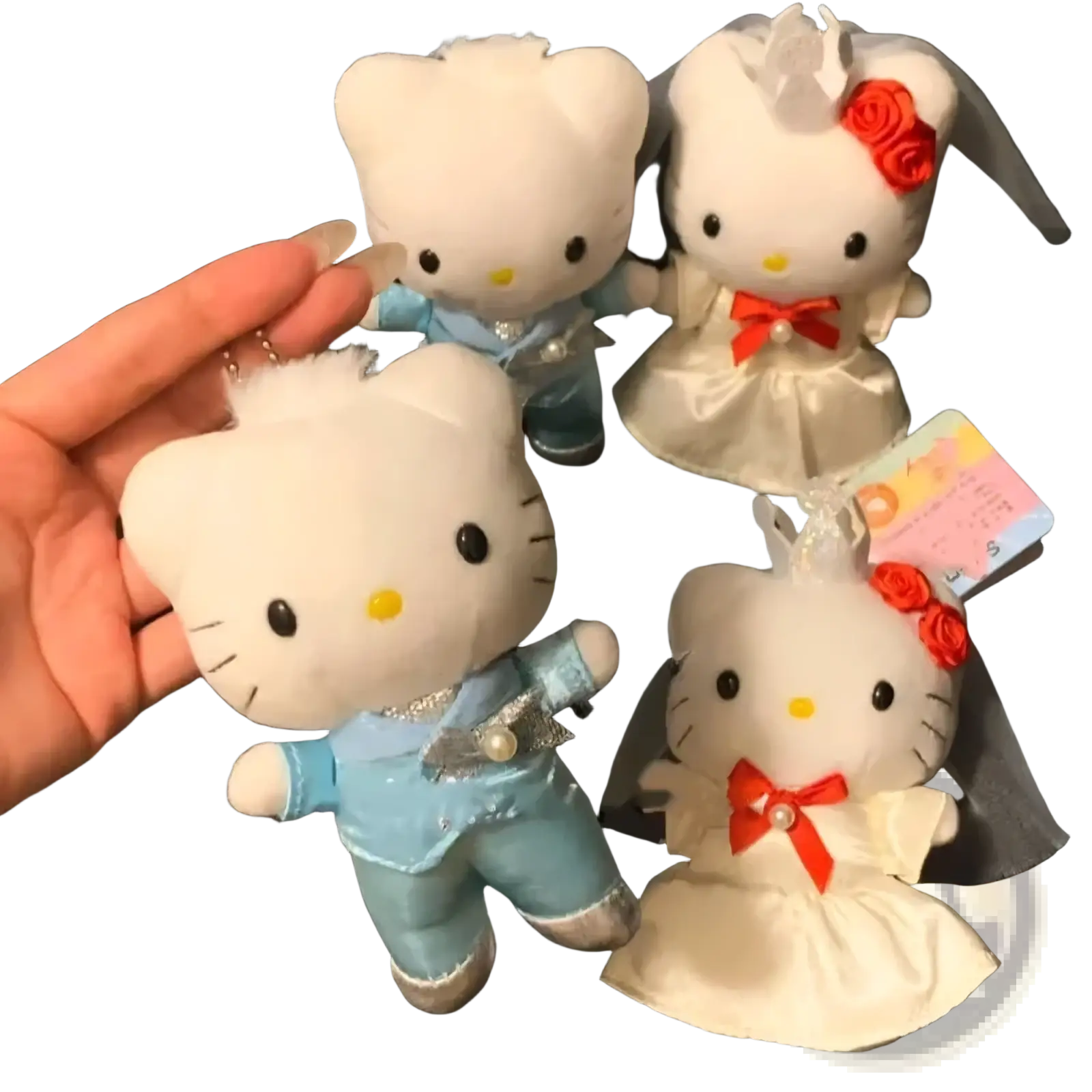 White hello kitty wedding couple plush keychain in blue and white attire with red bows and veils