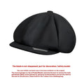 Black woolen herringbone octagonal flat cap with structured eight-panel design and metallic accent on the brim