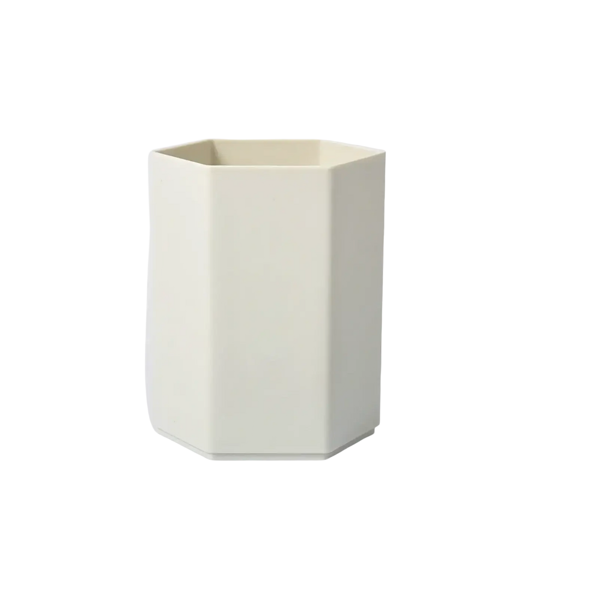 Cream-colored hexagonal plastic toothbrush holder suitable as a pen holder desk organizer for office or home use