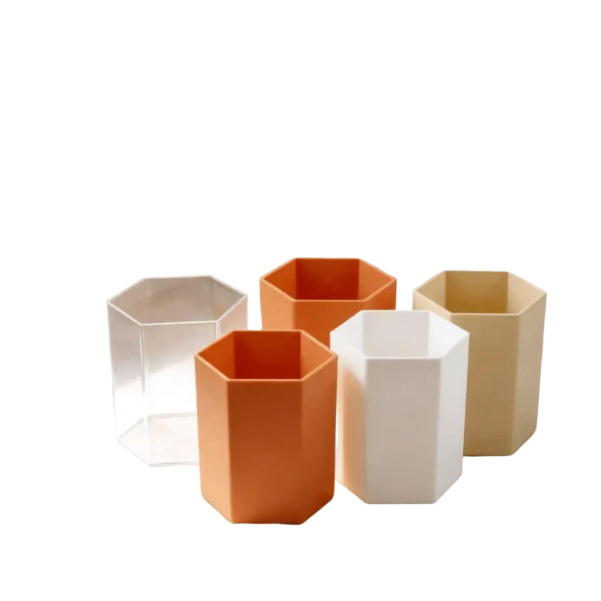 Set of hexagonal plastic pen holder desk organizers in clear orange white and beige for desktop storage